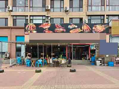 金州五一路临街带院精装烧烤店转让